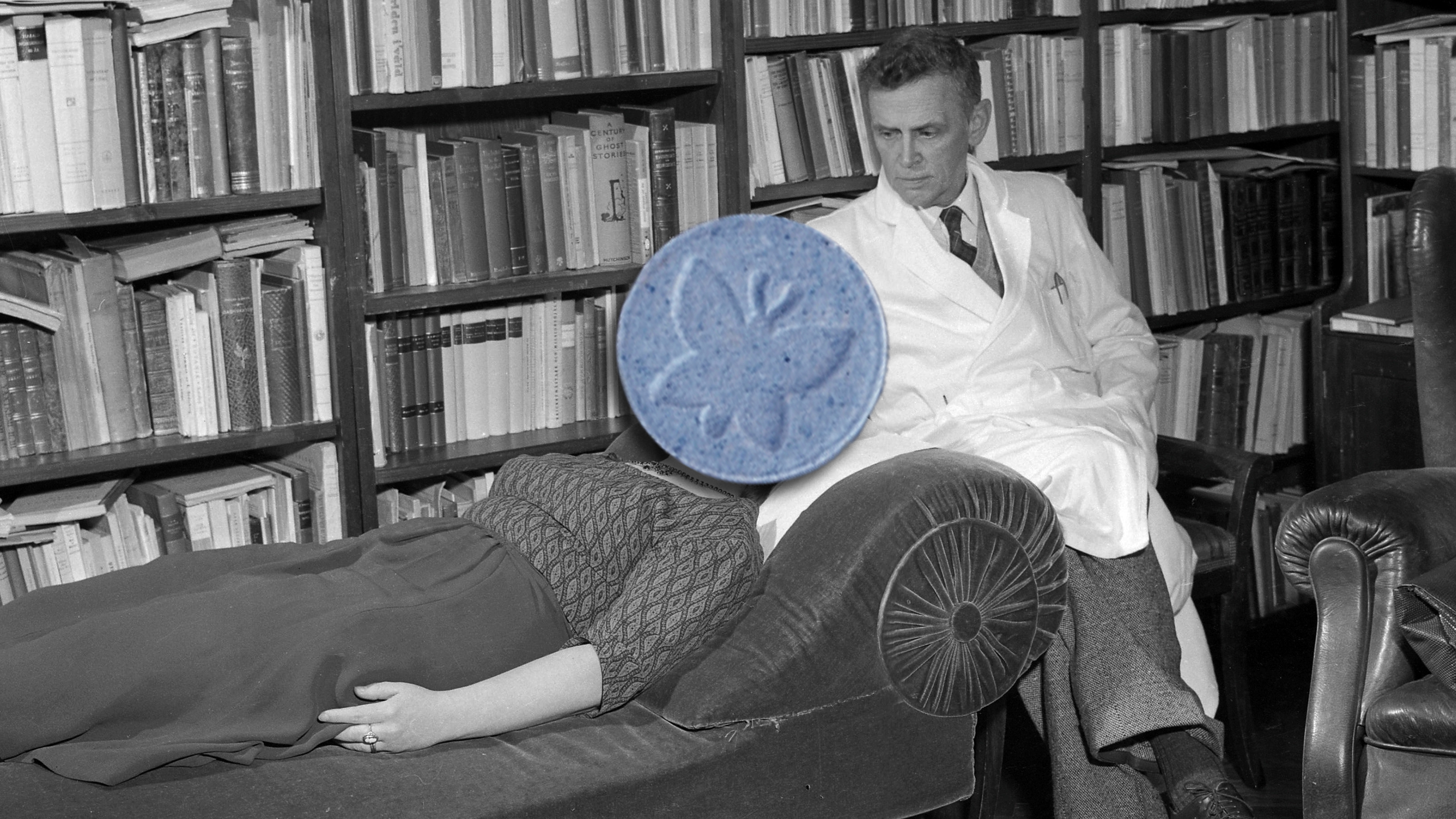 Photo illustration showcasing A woman is lying on a couch in a psychologist&#039;s office, with her therapist at her side. She has an MDMA pill over her head, illustrating psychedelic therapy.